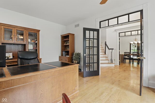 1478 W 500 S, Peru, IN 46970 - home office featuring light wood-style flooring, a ceiling fan, and french doors