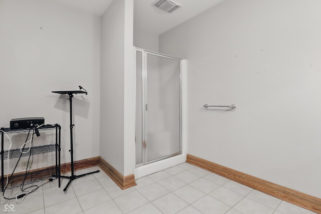 1478 W 500 S, Peru, IN 46970 - full bath featuring baseboards, a stall shower, and tile patterned flooring
