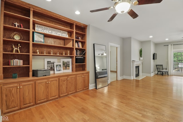 1478 W 500 S, Peru, IN 46970 - unfurnished living room featuring a ceiling fan, light wood-style floors, recessed lighting, baseboards, and a fireplace with flush hearth
