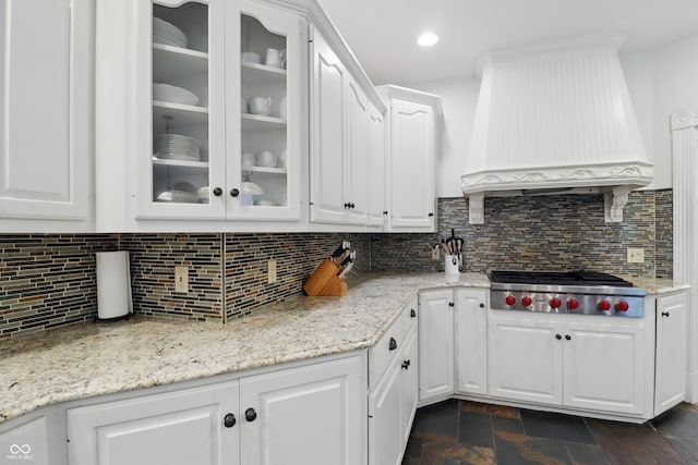 1478 W 500 S, Peru, IN 46970 - kitchen with stainless steel gas stovetop, premium range hood, white cabinetry, and glass insert cabinets