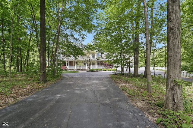 1478 W 500 S, Peru, IN 46970 - view of front of home featuring a porch and asphalt driveway