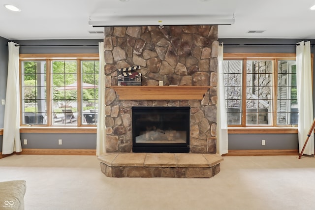 1478 W 500 S, Peru, IN 46970 - unfurnished living room with carpet, baseboards, and a fireplace