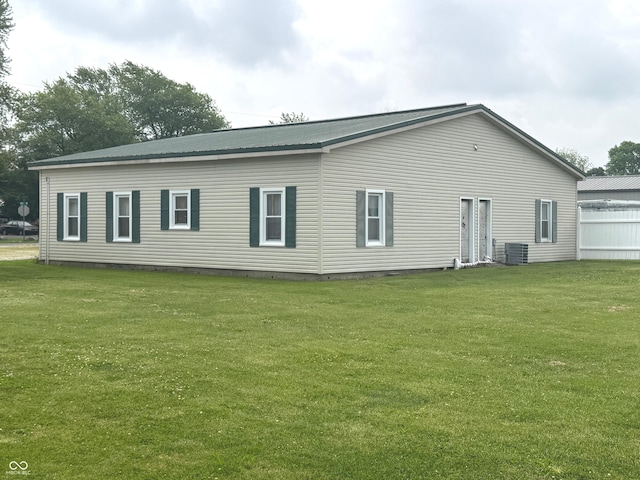 1123 S County Road 855 W, Greensburg, IN 47240 - back of house with a yard, central AC unit, and metal roof