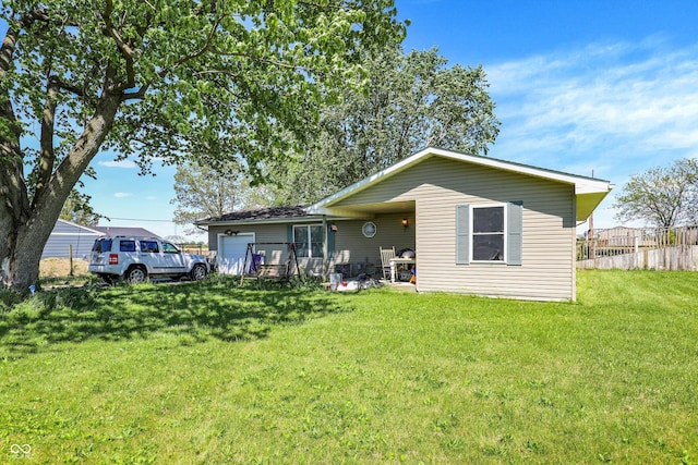 2200 N Dixon Rd, Kokomo, IN 46901 - back of house with a yard
