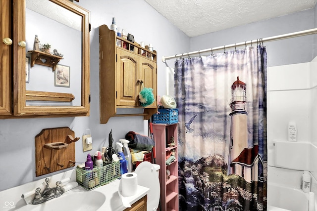 2200 N Dixon Rd, Kokomo, IN 46901 - full bathroom with a textured ceiling and vanity