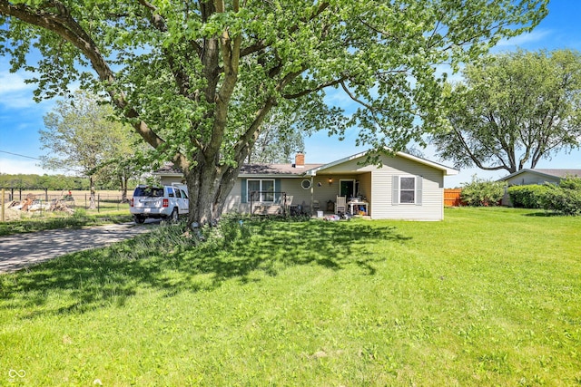 2200 N Dixon Rd, Kokomo, IN 46901 - view of front of house with a chimney and concrete driveway