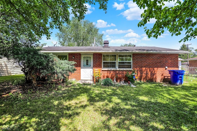 2200 N Dixon Rd, Kokomo, IN 46901 - ranch-style home with brick siding and a chimney