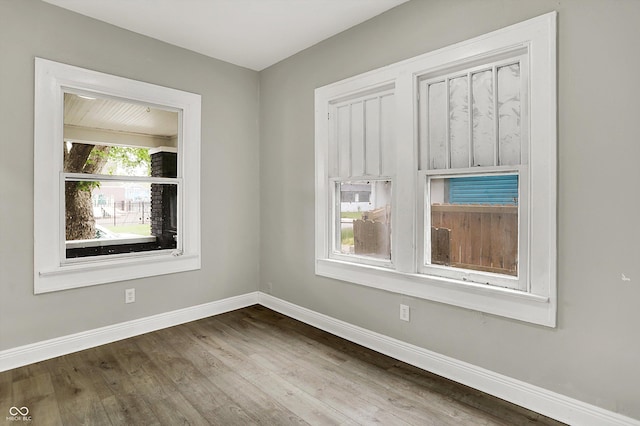 1033 N Dearborn St, Indianapolis, IN 46201 - empty room with baseboards and wood finished floors