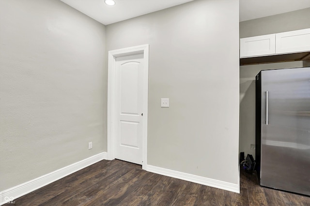 1033 N Dearborn St, Indianapolis, IN 46201 - unfurnished room featuring baseboards, dark wood-style floors, and recessed lighting
