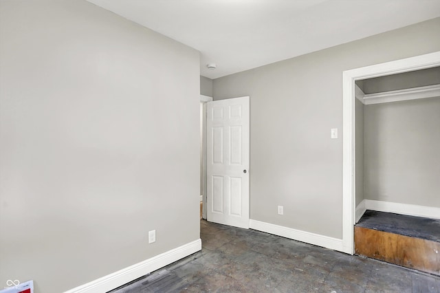 1033 N Dearborn St, Indianapolis, IN 46201 - unfurnished bedroom with baseboards