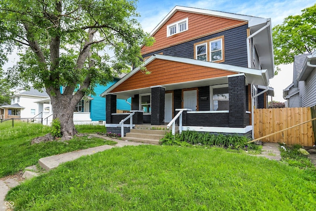 1033 N Dearborn St, Indianapolis, IN 46201 - american foursquare style home with a porch