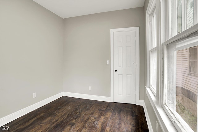 1033 N Dearborn St, Indianapolis, IN 46201 - empty room with baseboards and dark wood-style floors