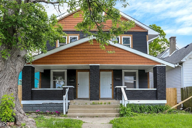 1033 N Dearborn St, Indianapolis, IN 46201 - view of front of property with covered porch