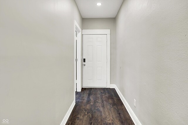 1033 N Dearborn St, Indianapolis, IN 46201 - hallway featuring baseboards, dark wood-style flooring, and recessed lighting