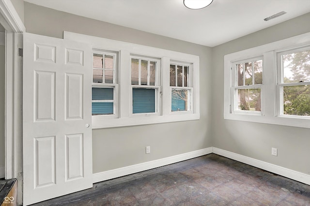 1033 N Dearborn St, Indianapolis, IN 46201 - empty room with baseboards and dark wood finished floors