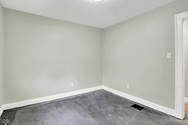 1033 N Dearborn St, Indianapolis, IN 46201 - unfurnished room with baseboards and unfinished concrete flooring