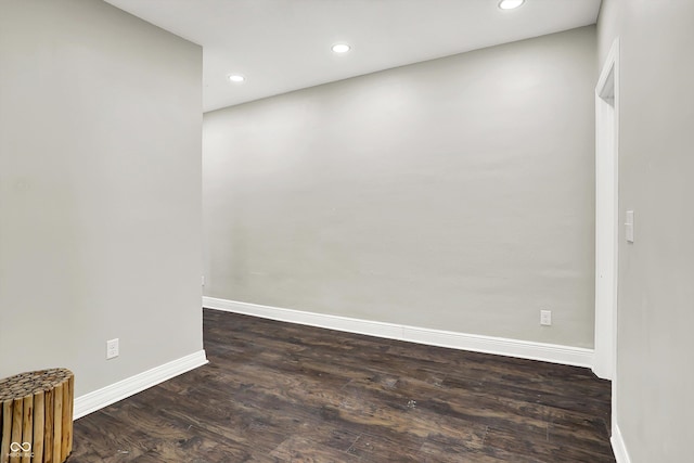 1033 N Dearborn St, Indianapolis, IN 46201 - empty room with baseboards, dark wood-style flooring, and recessed lighting