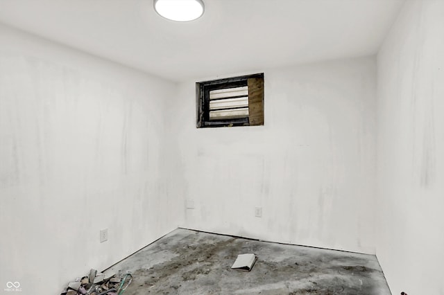 1033 N Dearborn St, Indianapolis, IN 46201 - empty room featuring unfinished concrete flooring