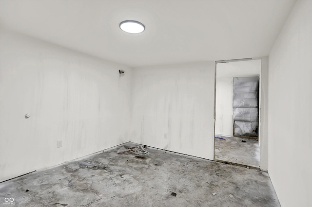 1033 N Dearborn St, Indianapolis, IN 46201 - empty room with concrete flooring