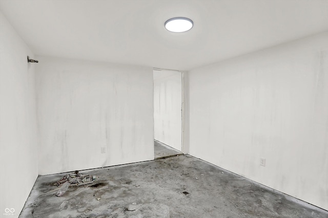 1033 N Dearborn St, Indianapolis, IN 46201 - empty room with unfinished concrete flooring