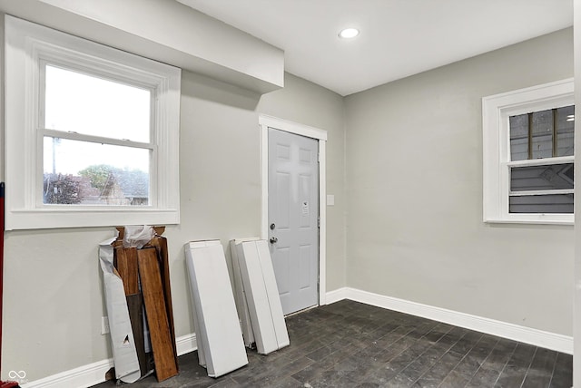 1033 N Dearborn St, Indianapolis, IN 46201 - foyer entrance with baseboards, dark wood finished floors, and recessed lighting