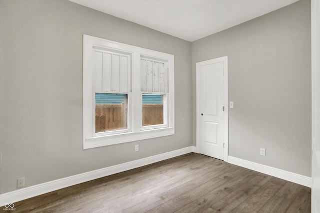 1033 N Dearborn St, Indianapolis, IN 46201 - unfurnished room with baseboards and wood finished floors