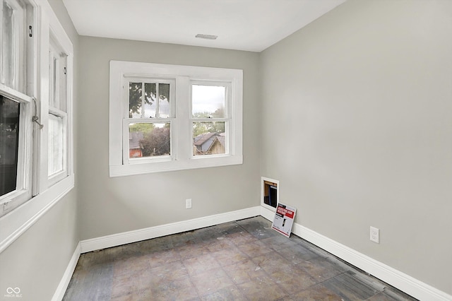 1033 N Dearborn St, Indianapolis, IN 46201 - laundry area featuring baseboards