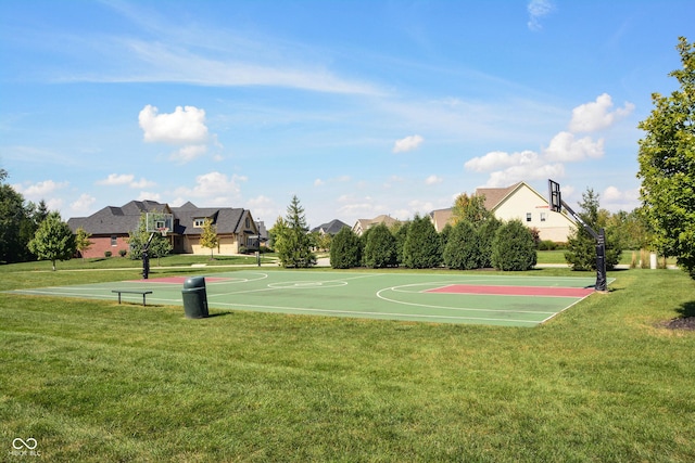 view of sport court with a yard, community basketball court, and a residential view