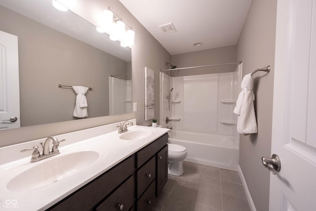 full bath featuring double vanity, tile patterned flooring, toilet, baseboards, and shower / tub combination