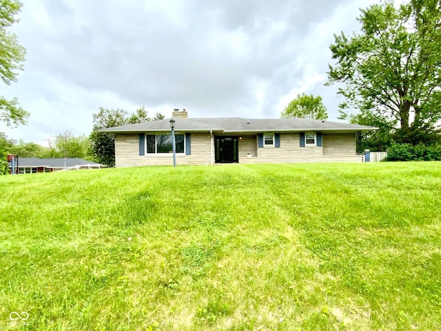2221 E 35th St, Anderson, IN 46013 - ranch-style home featuring a chimney and stone siding