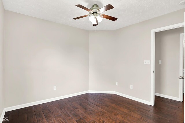 2201 Schoolmarm Dr, Greenfield, IN 46140 - unfurnished room with dark wood-type flooring, ceiling fan, baseboards, and a textured ceiling