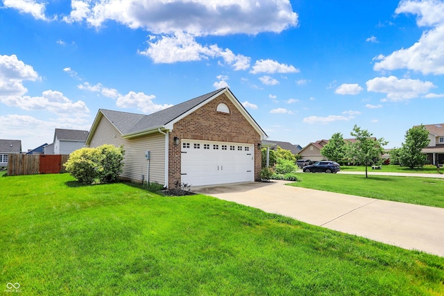 2201 Schoolmarm Dr, Greenfield, IN 46140 - view of front of property with brick siding, an attached garage, driveway, and a residential view