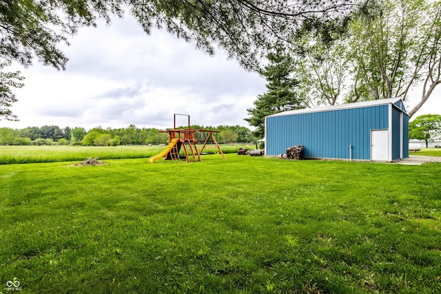 2965 E 1100 N, Pendleton, IN 46064 - view of green lawn with a playground and an outbuilding