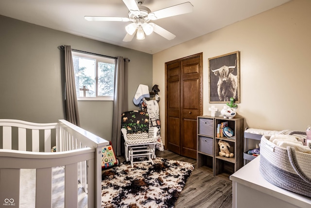 2965 E 1100 N, Pendleton, IN 46064 - bedroom featuring wood finished floors, a ceiling fan, a closet, and a crib