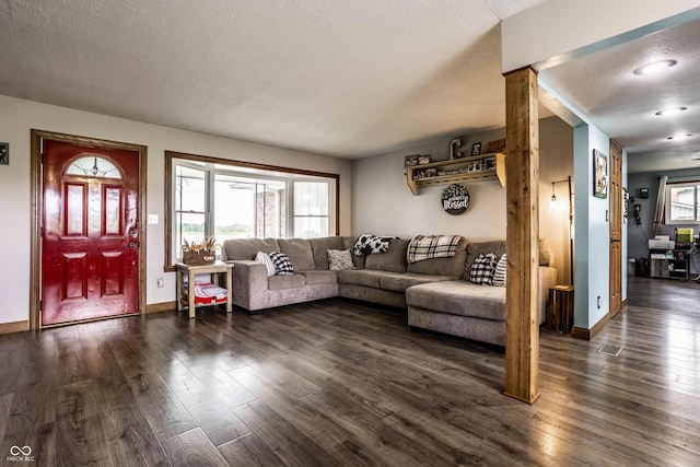 2965 E 1100 N, Pendleton, IN 46064 - living room with dark wood-type flooring, a textured ceiling, and baseboards