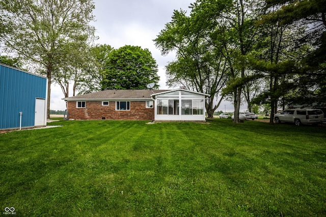 2965 E 1100 N, Pendleton, IN 46064 - rear view of property with a sunroom, a yard, and brick siding