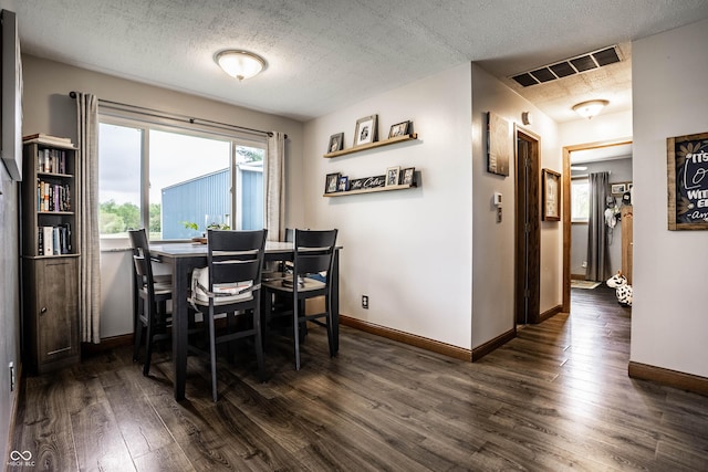 2965 E 1100 N, Pendleton, IN 46064 - dining space with dark wood-style floors, a textured ceiling, and baseboards