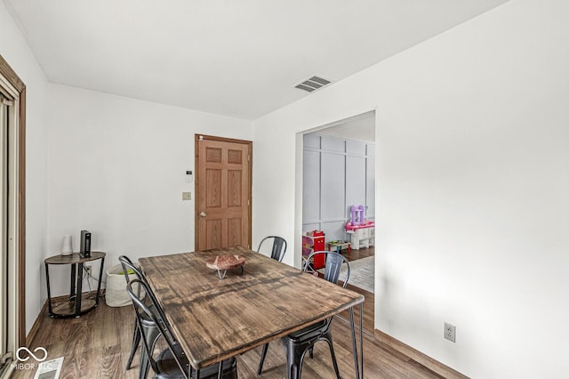 5427 Heights Ave, Indianapolis, IN 46237 - dining area with wood finished floors and baseboards