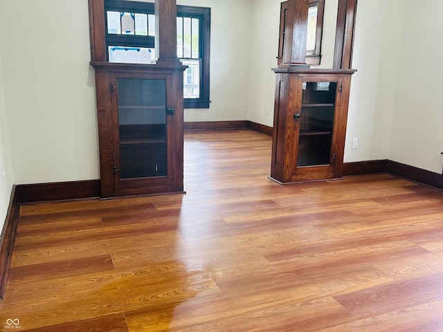 1718 Thaddeus St, Indianapolis, IN 46203 - unfurnished room featuring wood finished floors and baseboards