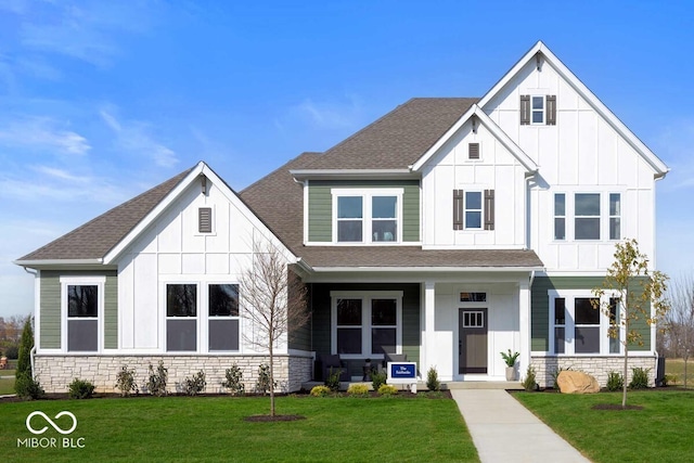 19848 Chatsworth Blvd, Westfield, IN 46074 - view of front facade featuring board and batten siding, a front yard, and roof with shingles
