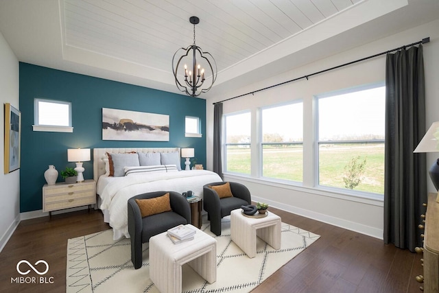 19848 Chatsworth Blvd, Westfield, IN 46074 - bedroom with a tray ceiling, baseboards, a chandelier, wooden ceiling, and wood finished floors