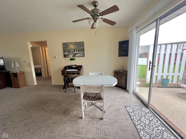 2508 Pamela Ct, Anderson, IN 46012 - dining area featuring light carpet and ceiling fan