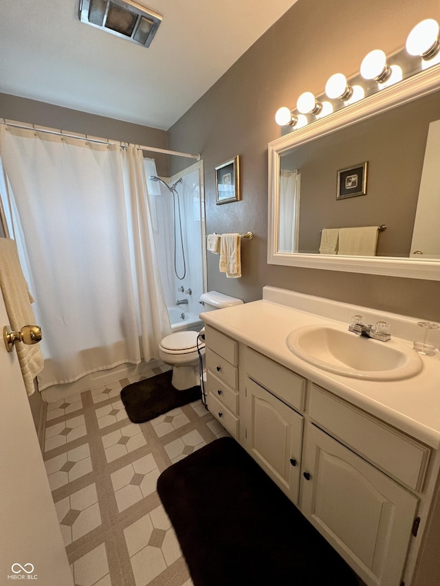 2508 Pamela Ct, Anderson, IN 46012 - bathroom featuring tile patterned floors, toilet, vanity, and shower / bath combo