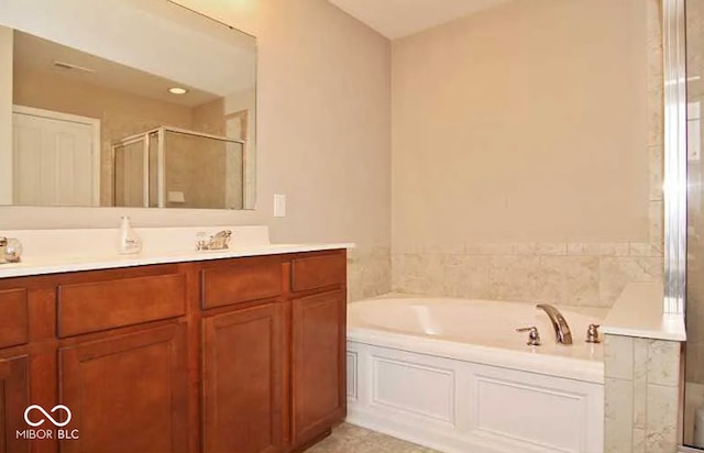6304 El Paso St, Whitestown, IN 46075 - full bathroom featuring a stall shower, a bath, and vanity