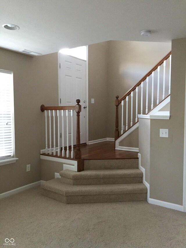 6304 El Paso St, Whitestown, IN 46075 - stairway with carpet flooring and baseboards