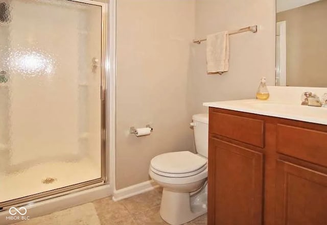 6304 El Paso St, Whitestown, IN 46075 - full bath with a shower stall, toilet, vanity, tile patterned flooring, and baseboards