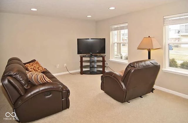 6304 El Paso St, Whitestown, IN 46075 - living area featuring carpet flooring, healthy amount of natural light, baseboards, and recessed lighting