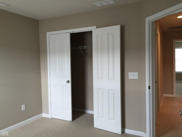 6304 El Paso St, Whitestown, IN 46075 - unfurnished bedroom with light colored carpet, baseboards, and a closet