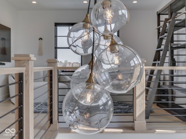 detailed view of recessed lighting and wood finished floors