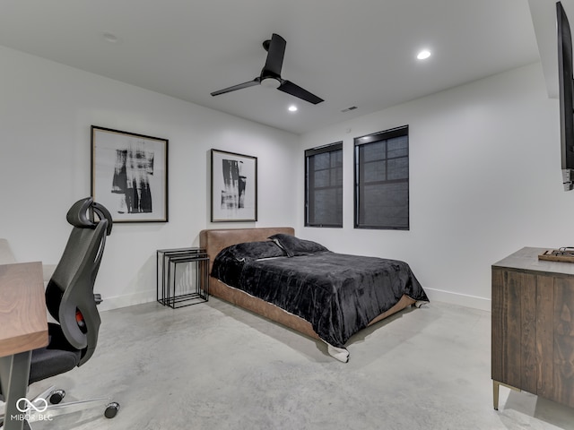 bedroom with baseboards, recessed lighting, a ceiling fan, concrete flooring, and a desk